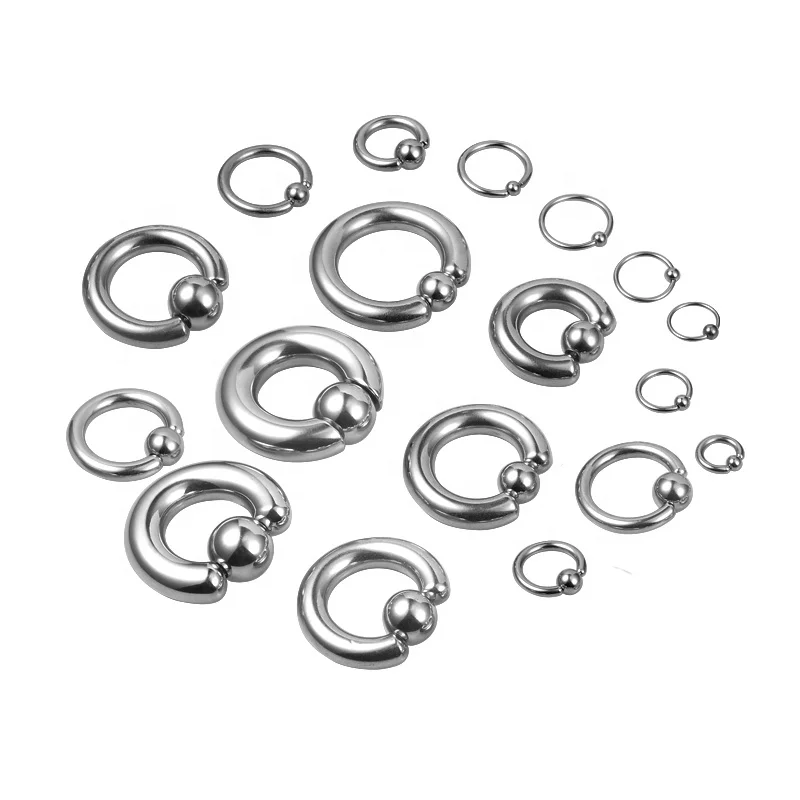 Stainless steel piercing jewelry heavy large gauge spring loaded snap fit ball closure ring