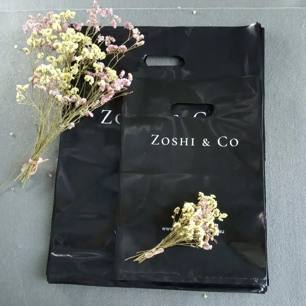 Wholesale plastic die cut handle shopping bag,good quality plastic shopping bags for sales