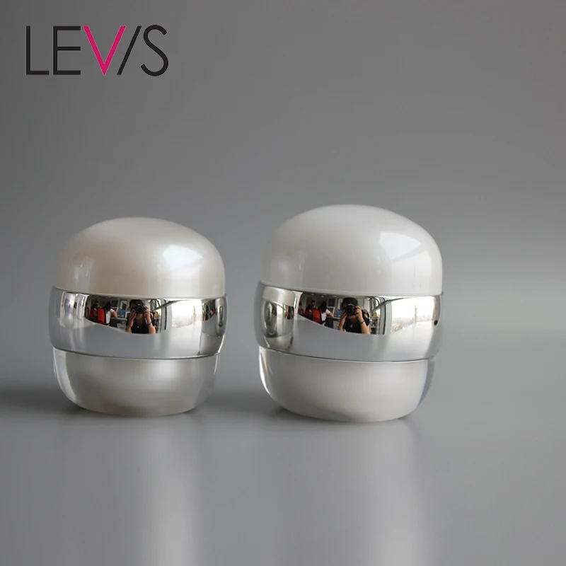 
Most Popular Pearl White Acrylic Ball Vacuum Cosmetic Face Cream Jars 50g 