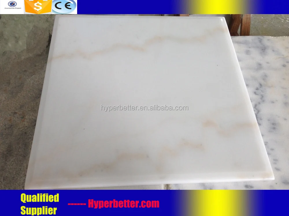 White quartz table top square with wrought iron table leg