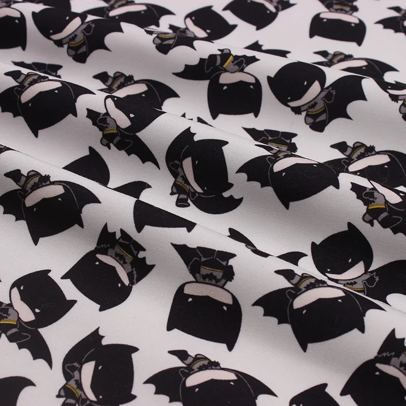 In stock twill peach skin fabric with cartoon batman print for children jacket