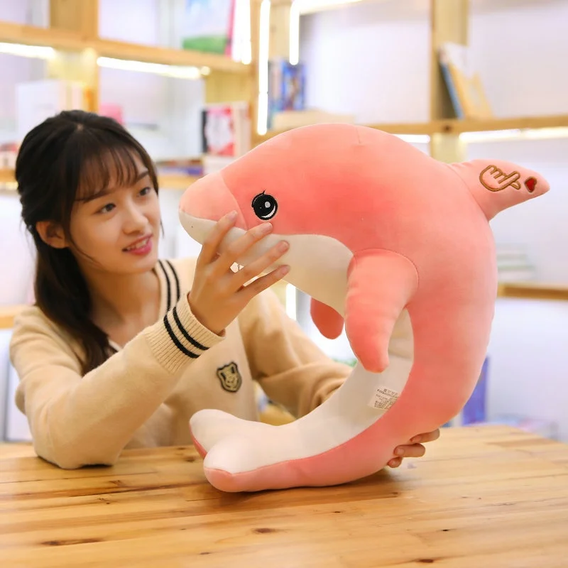 plush dolphin with hand pose logo on back baby toy