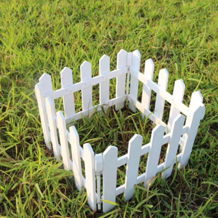White Wood picket fence for garden patio landscape plants decorative