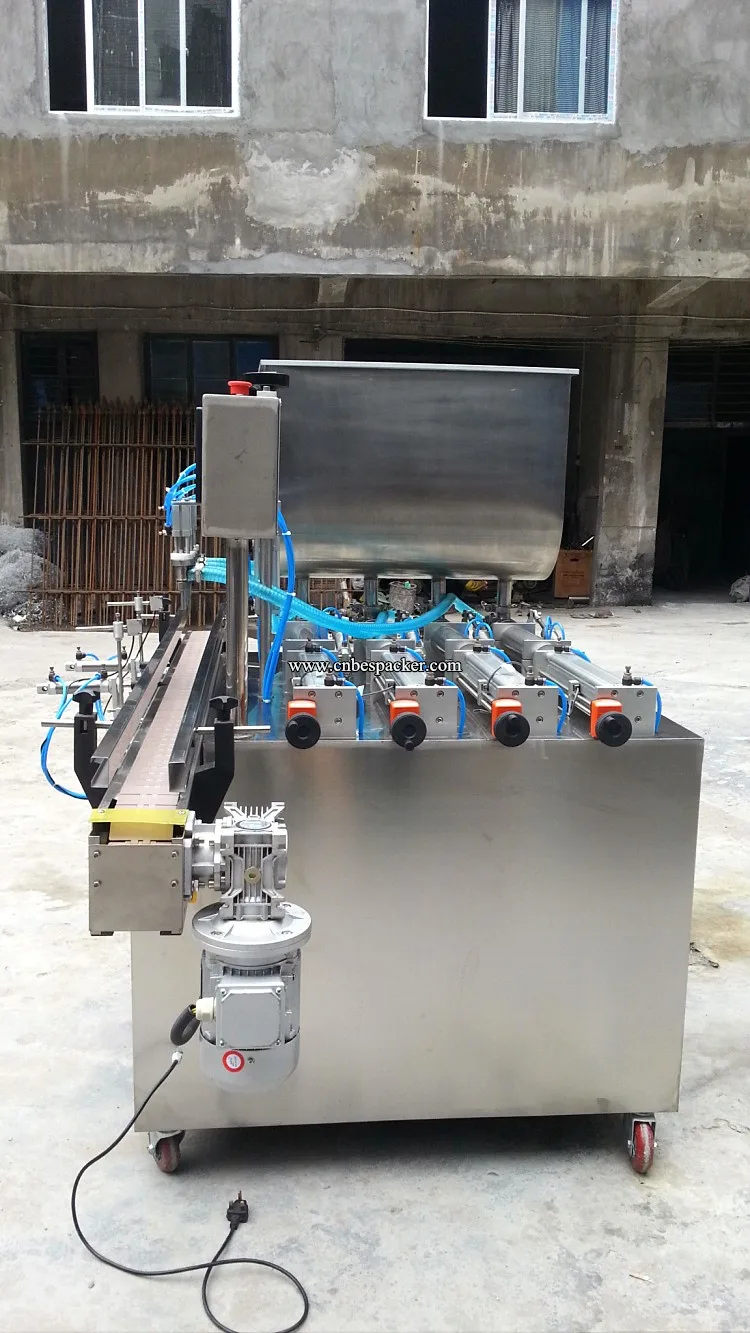 Automatic 4 nozzles milk bottle mineral water filling machine