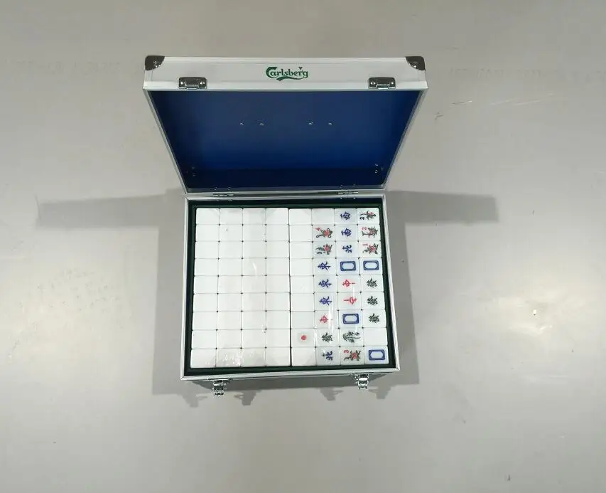 
double aluminum storage case with mahjong in it 