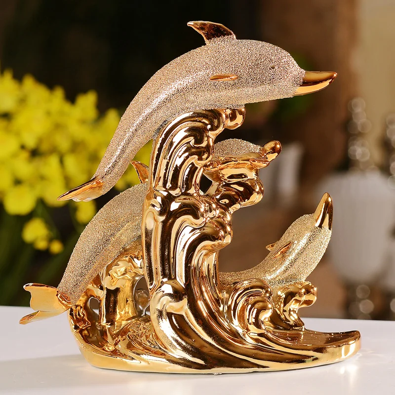 
Fashionable design gold color plated custom ceramic dolphin statues 