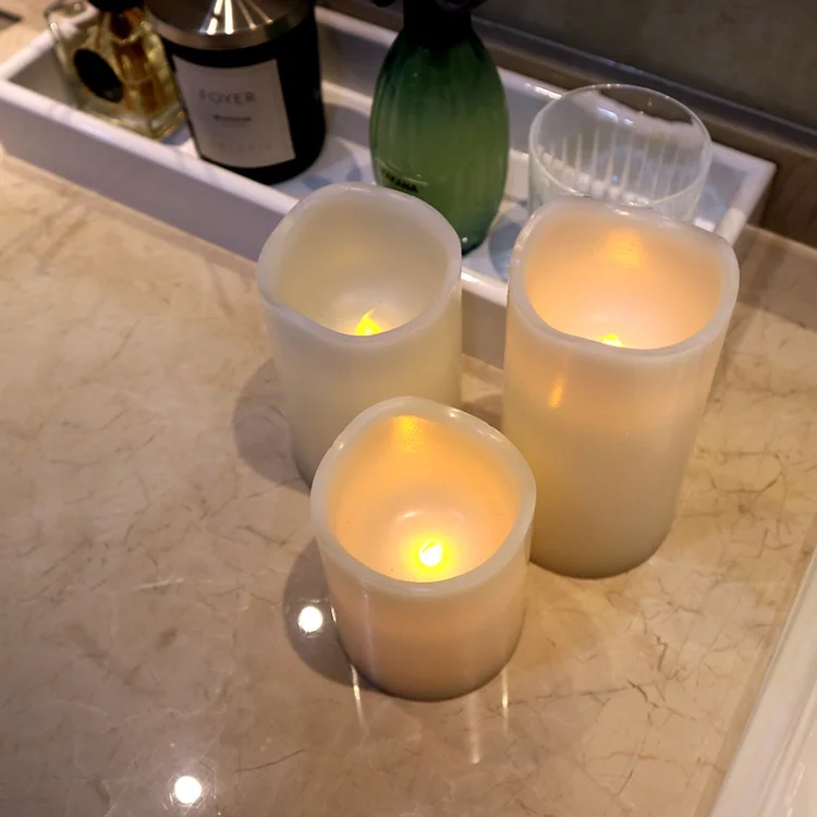 
Wholesale home decoration wax smokeless flameless moving wick pillar led electric candles with timer 