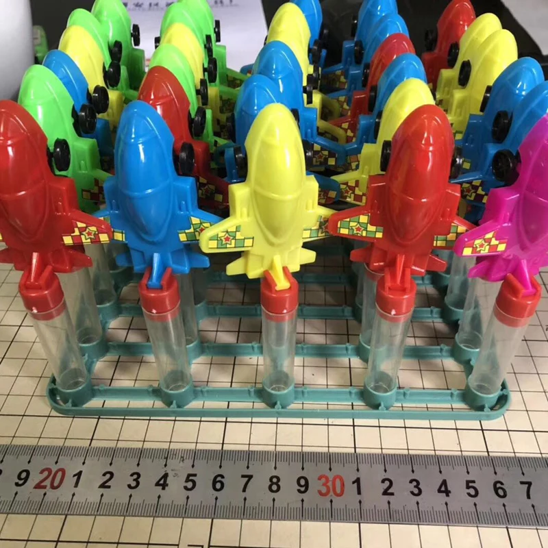
plane shape candy toy with candy inside 