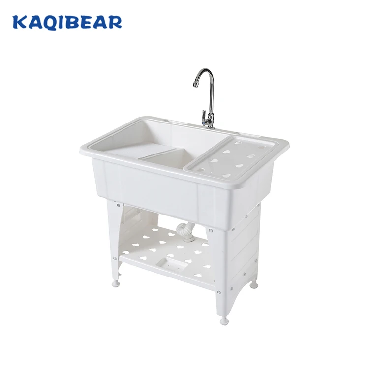 
Plastic laundry tub wash sink with a washboard 
