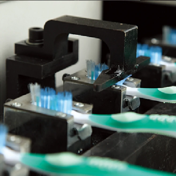 
Toothbrush making automatic surface trimming machine 