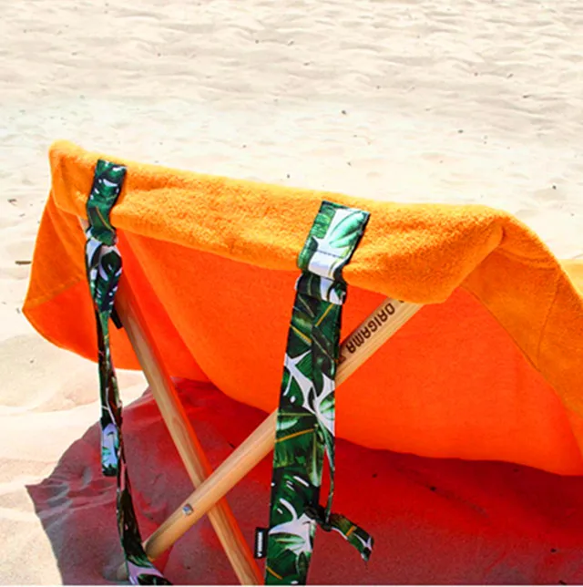 beach towel with sticks plain dyed logo embroidery Origama