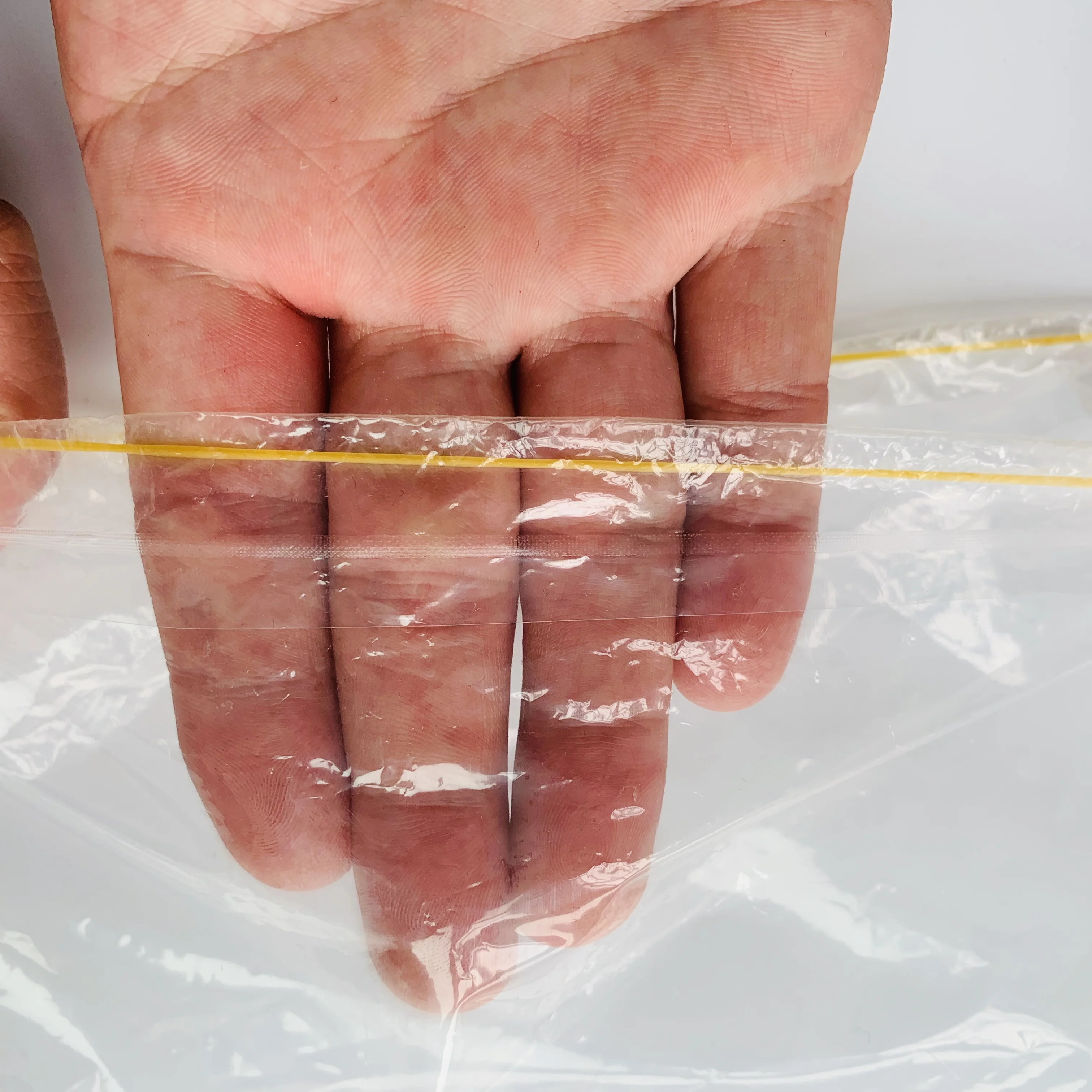 
clear transparent PE plastic square bottom bag with elastic band opening 