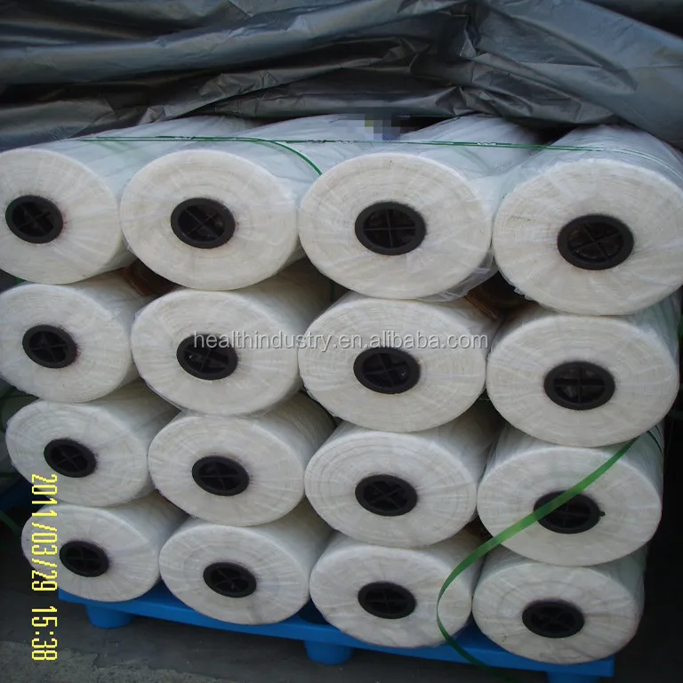 Белый и темно-зеленый шелковый тюк netwrap