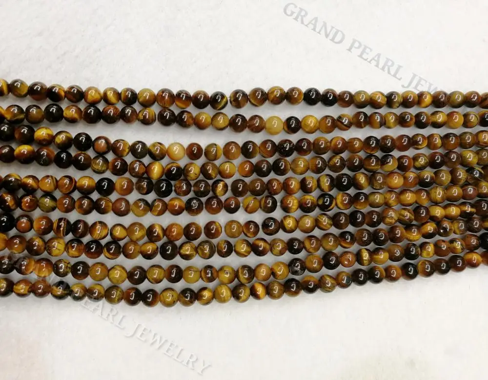 
Yellow / Brown Tigereye round beads in 16