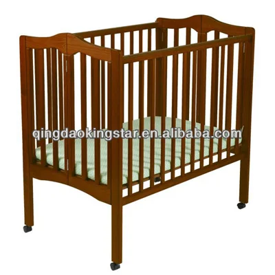 
folding wood baby crib / cot 