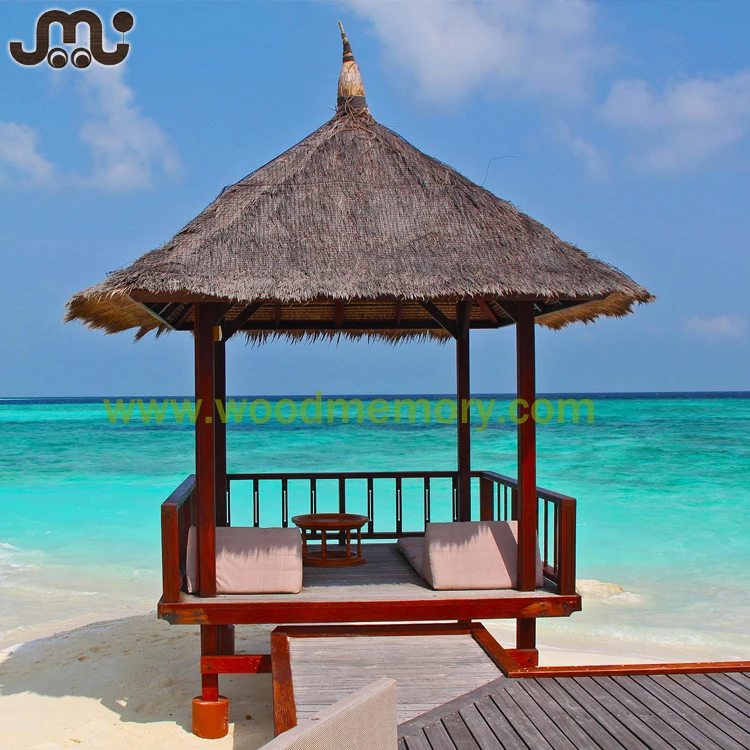 Ancient handmade viewpoint wooden beach tiki hut