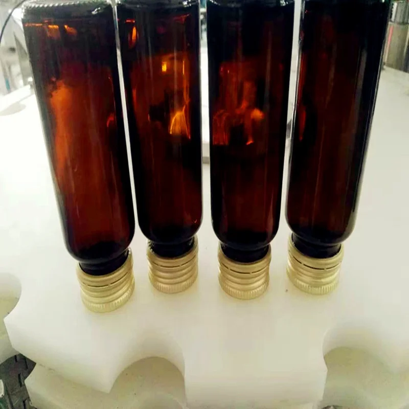 
High precision 200ml glass bottle filling machine for liquid syrup rotary dry syrup powder filling machine manufacturers 