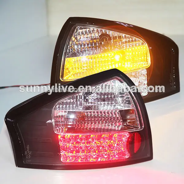 для audi a6 привело задний фонарь 1999-04 год белый черный