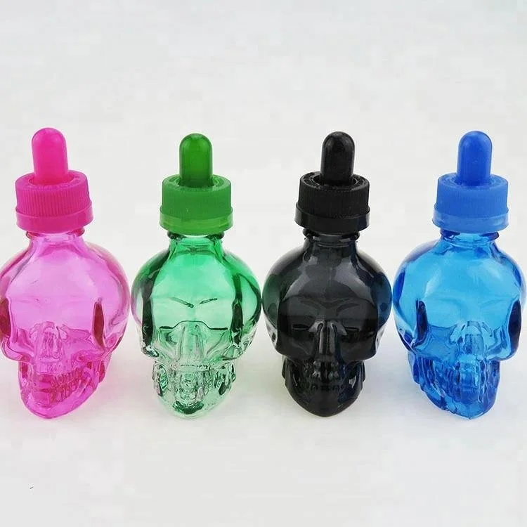 wholesale attar crystal 10ml 20ml 30ml color glass bottle skull shape perfume bottle with aluminum cap