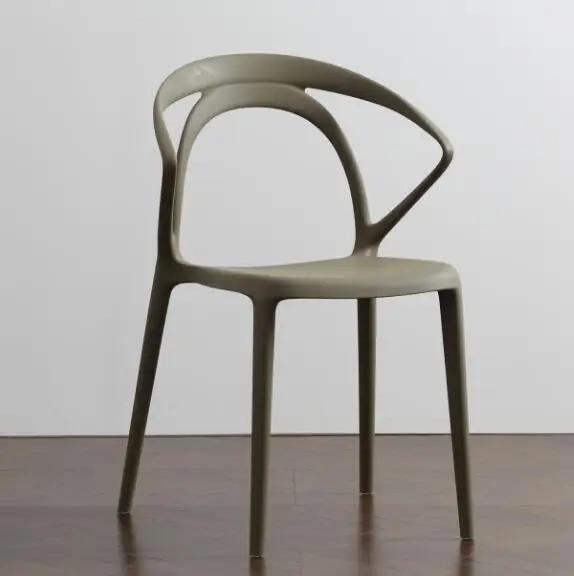 Patented factory modern stacking designer hole back black white pp stackable dining plastic chair for sale