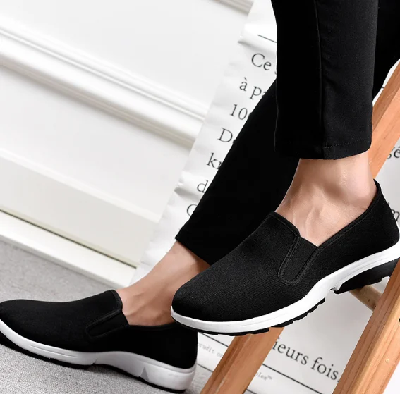New design factory wholesale custom casual fashion lazy person canvas soft sole slip-On flat comfortable men canvas shoes