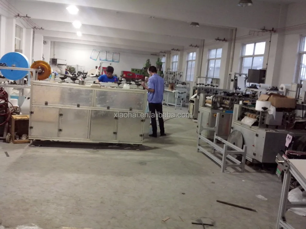 
16x40cm size pe non woven shoe cover making machine with good quality and speed 