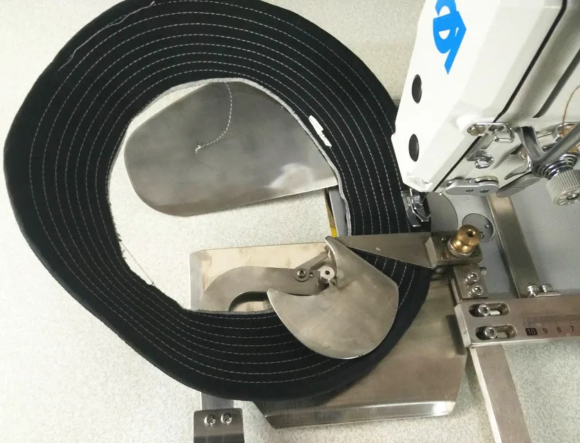 Hat visor automatic sewing machine with computer control