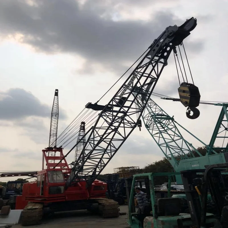 50 тонн, японский бывший в употреблении гусеничный кран hitachi kh180, продажа в Шанхае, Китай