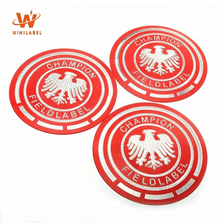 
China New Design Custom Brand Name 3D Embossed TPU Rubber Heat Iron on Garment Badges for Clothes 