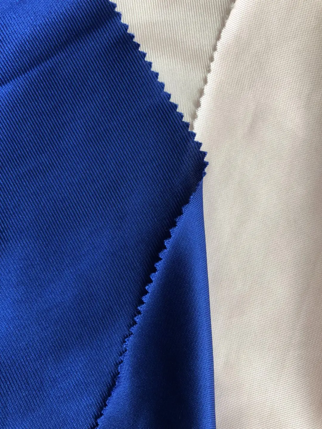 huzhou liwei Warp Knitted 100% Polyester Tricot Dazzle Fabric Tracksuit Fabric