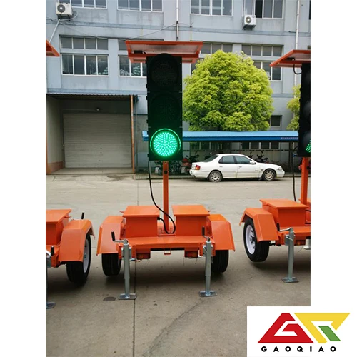 Portable traffic light wireless control mounted on trailers with solar power for temporary use