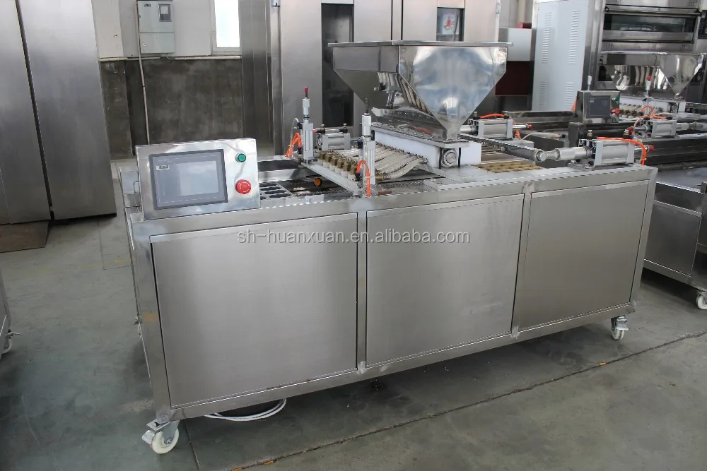 Cake depositor/Cake forming machine