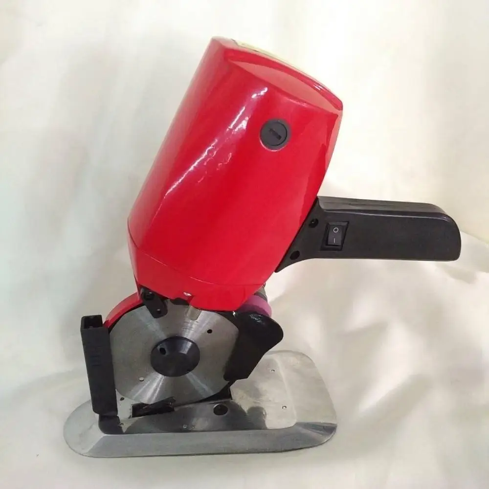 Red color RS-100 cutting machine for cloth with spare blade