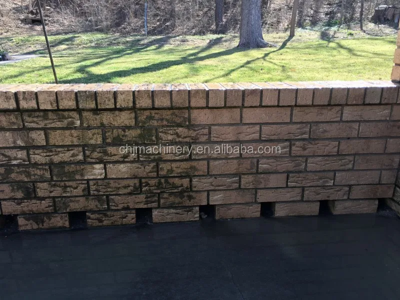 Wet bead blasting machine for paint off concrete block wall