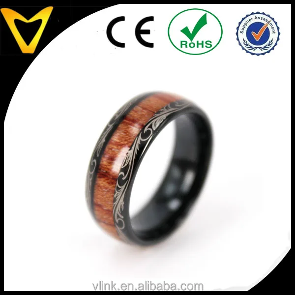 Koa wood inlay black tungsten wedding ring with floral logo lasered on edges koa wood inlay tungsten carbide ring