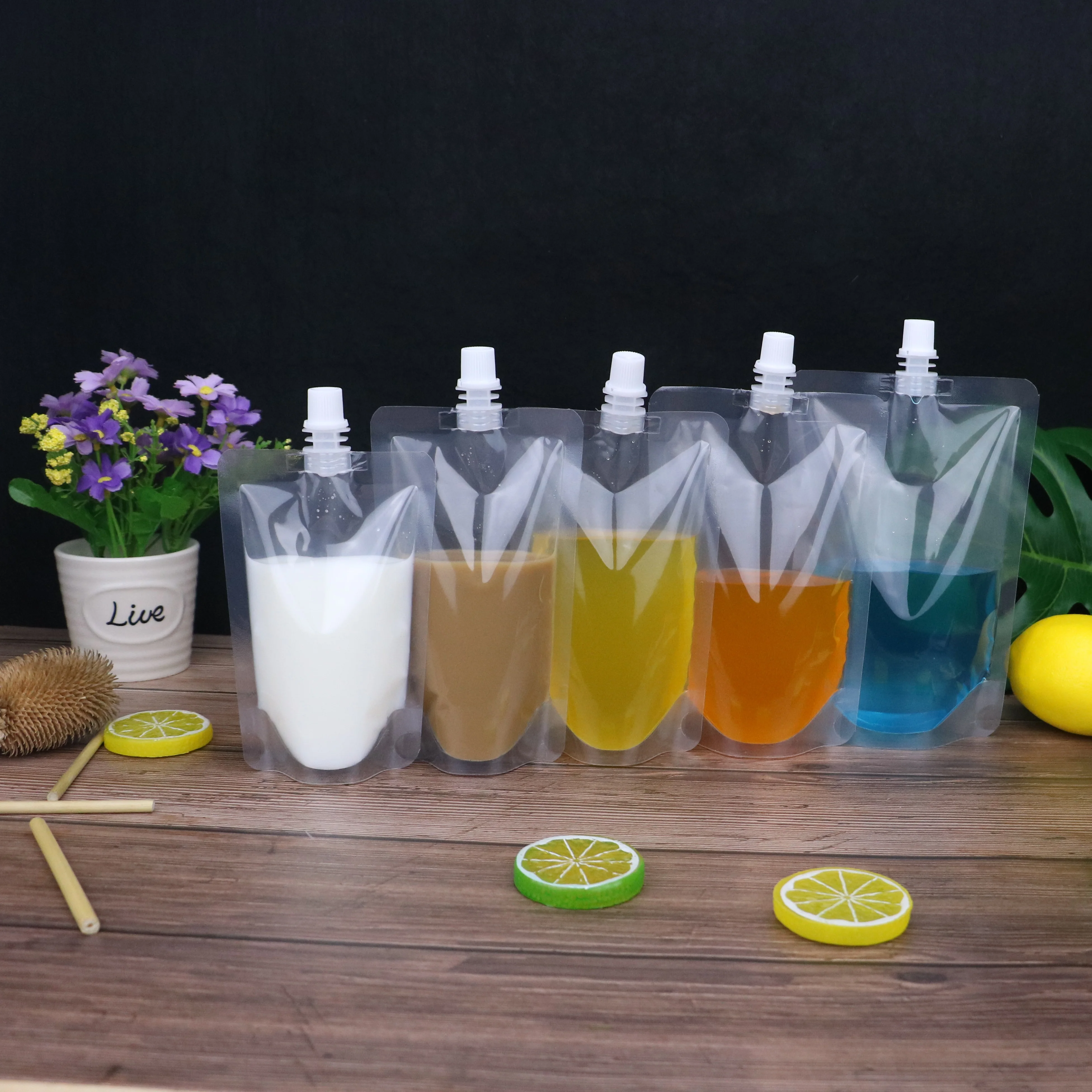 Clear Transparent Plastic Stand Up Packaging Soft Drink Bag with Spout
