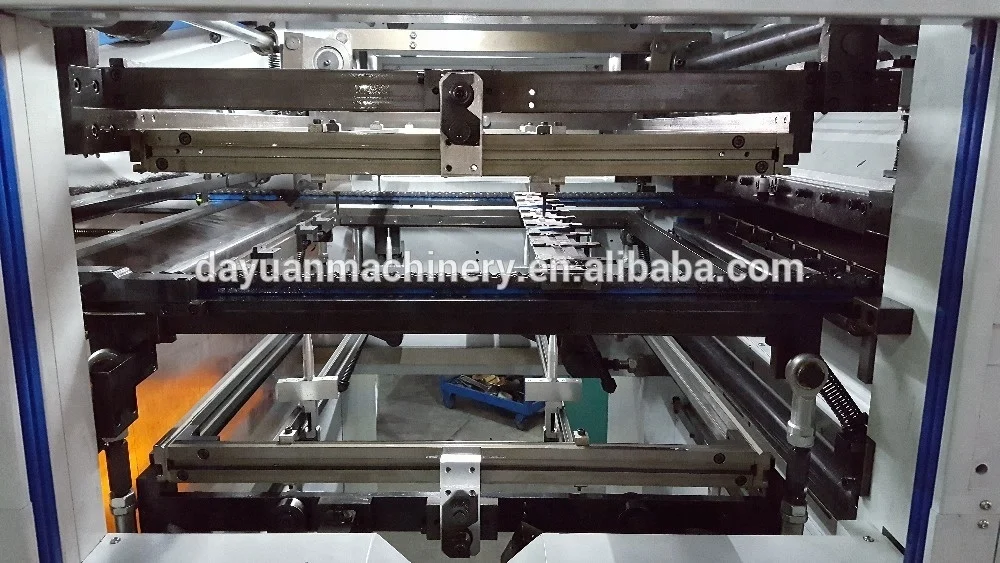 DAYUAN MHC-1060CE cardboard automatic sheet fed flatbed die cutting machine with stripping