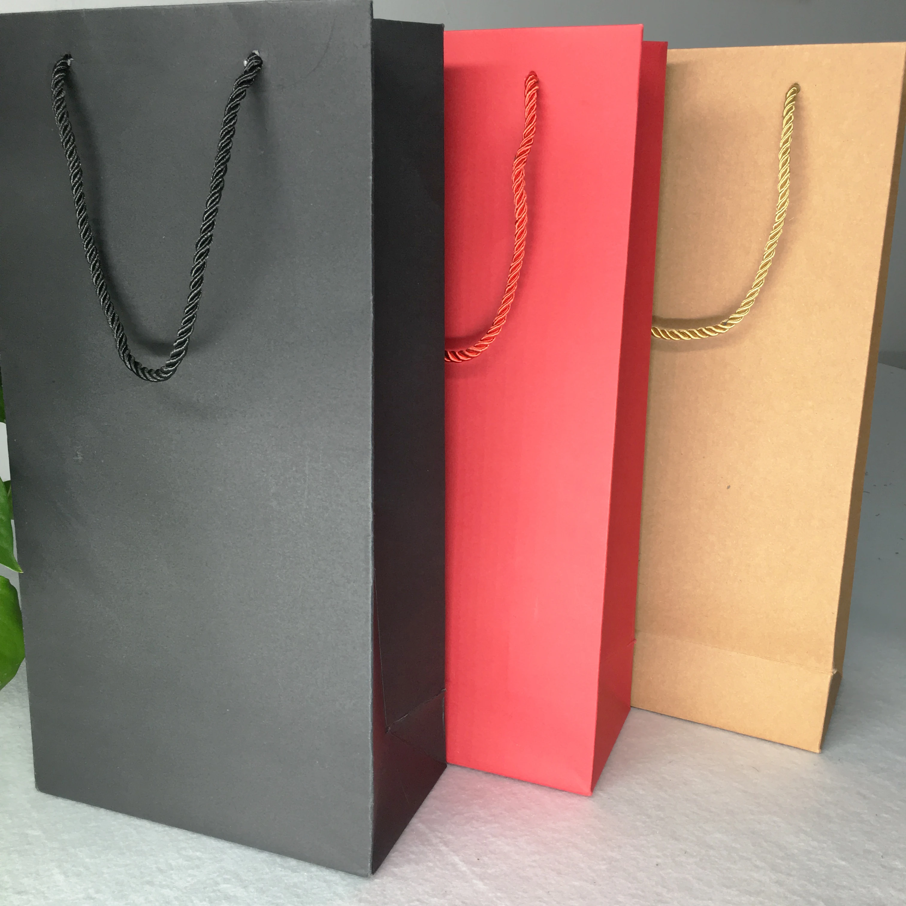 custom vertical type black/white cardboard paper bag with cotton rope