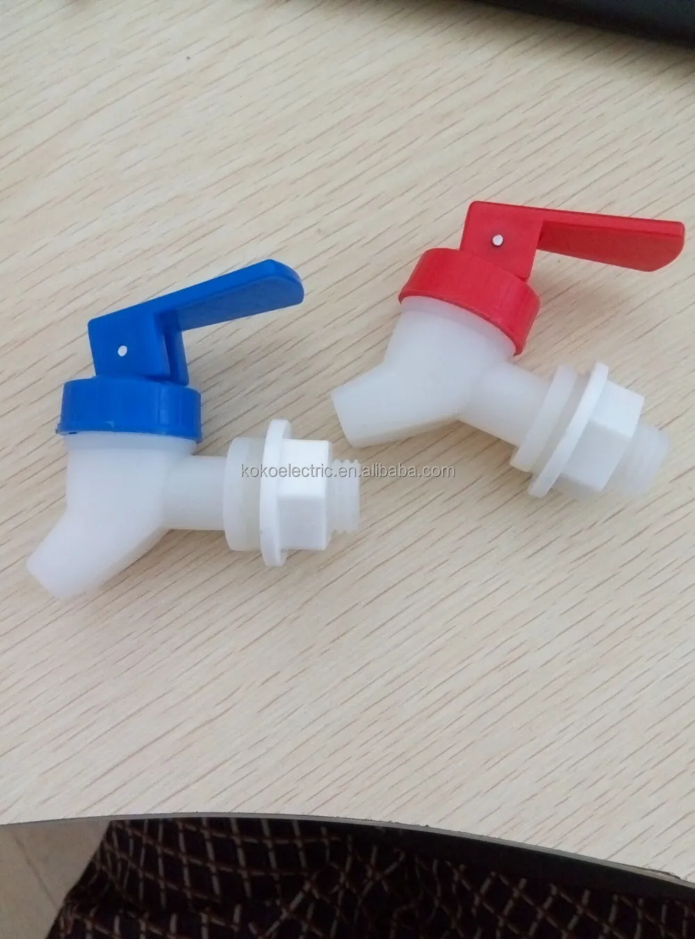 Plastic bottled water dispenser tap with red or blue handle