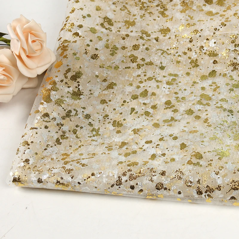 Wholesale polyester golden transparent spotted flash mesh fabric for clothing