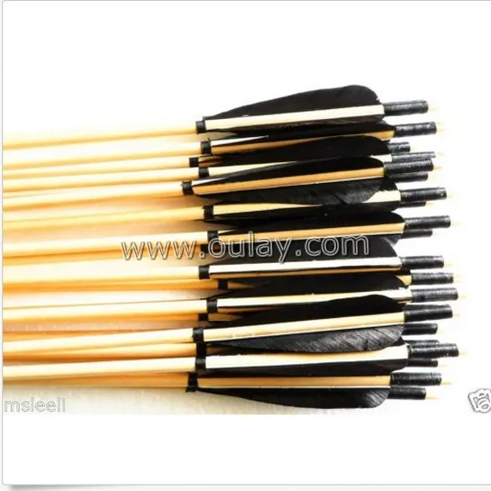 hunting wood arrows handmade wooden arrow shafts white and black plain feathers silver arrow tips archery traditional  hunting