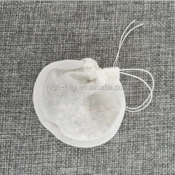 
E1008 Biodegradable Eco Friendly Round Filter Paper Empty Tea Bag For Packaging 