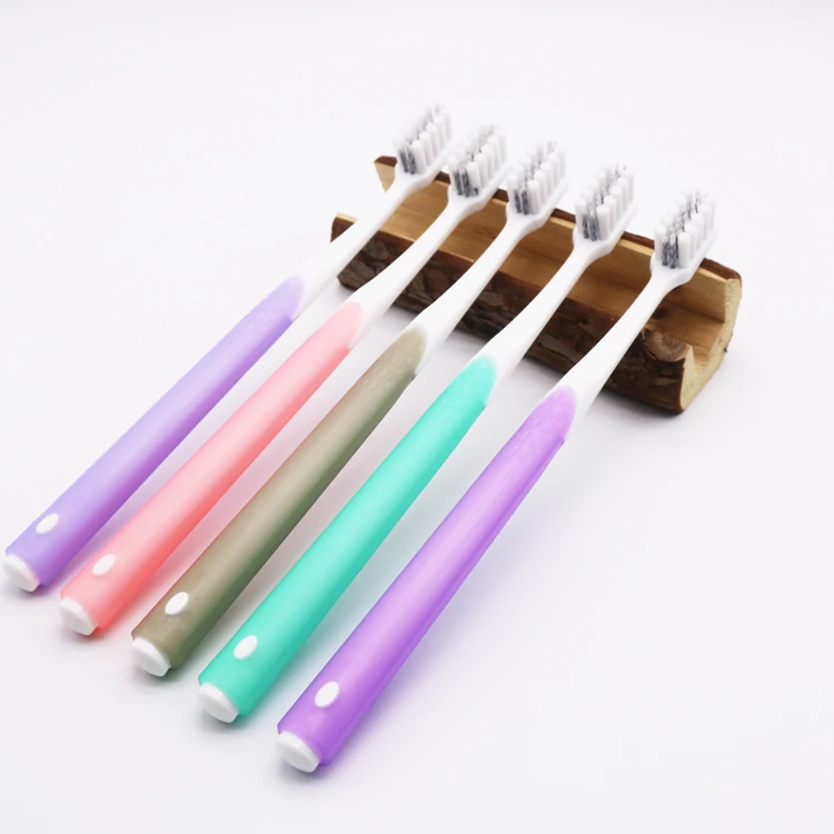 wholesale new design adult tooth brush for daily use oral care toothbrush