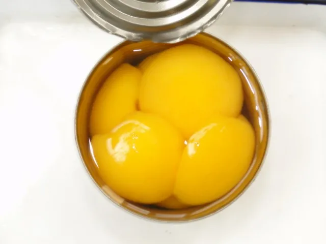 Недорогие консервированные желтые персиковые половинки хорошего качества