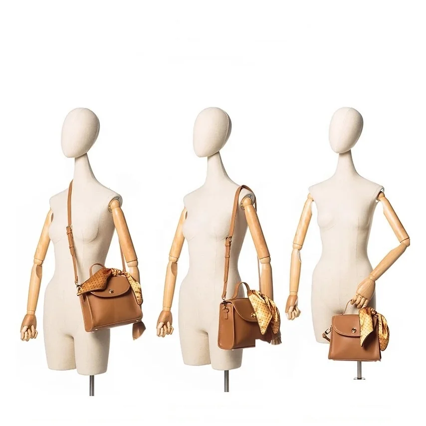 Wooden hands woman torso fabric dummy, display or dressmaking mannequin