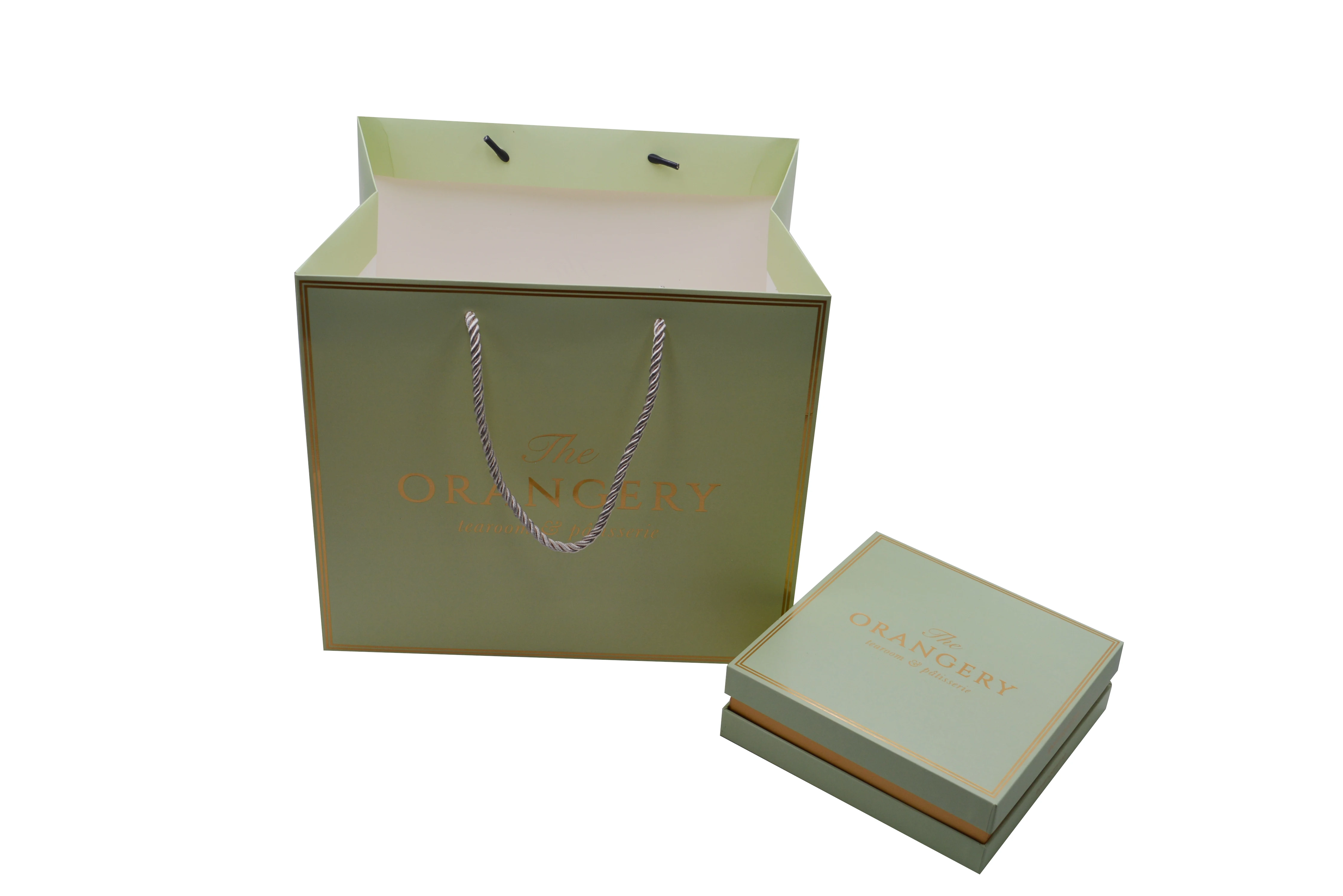 
Luxury golden logo printed shopping paper bag with rope handles for clothing Jade bracelets wooden figures gift packaging bag 