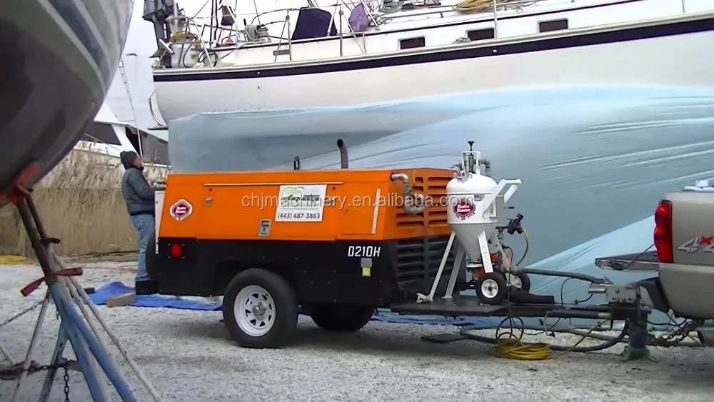 Wet bead blasting machine for paint off concrete block wall