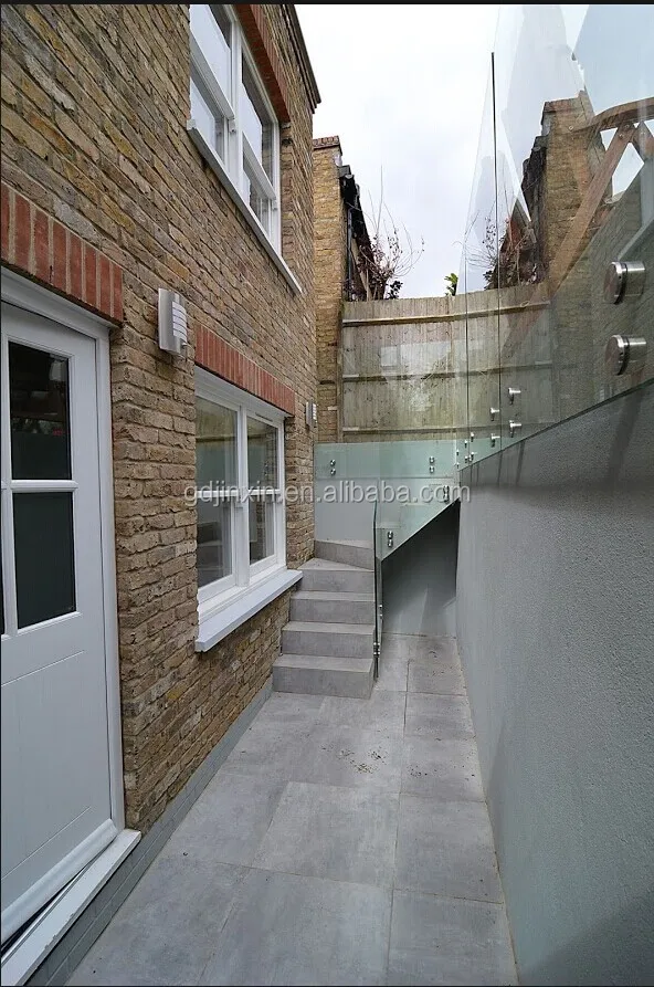 
Frameless glass balustrade side fixed pinned glass with stainless steel standoffs 