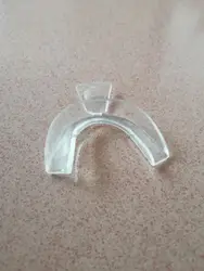 injection molded medical instrument teeth whitening mouth guard