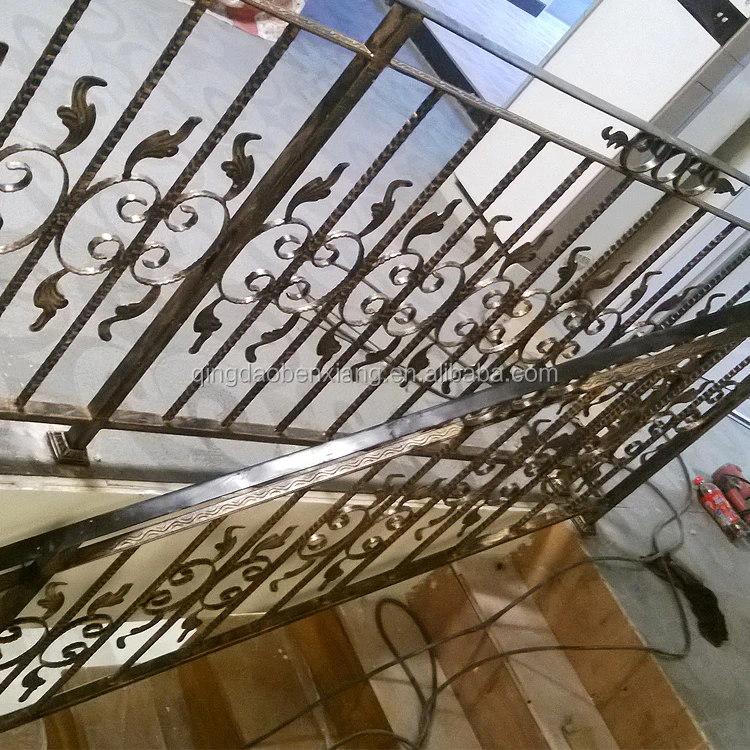 Wrought forged iron curved outdoor stair railings